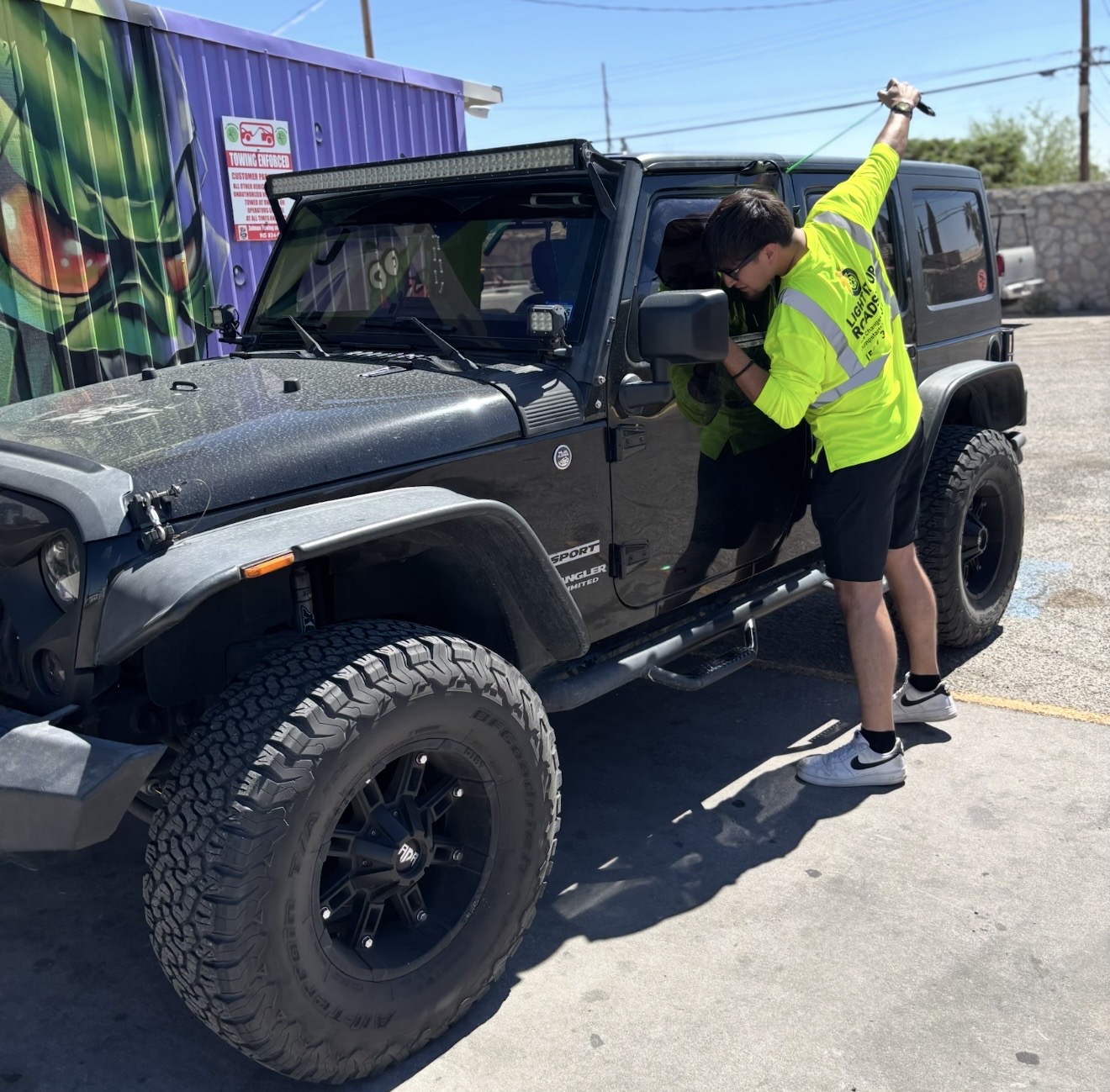 Light It Up Roadside technician performing a car lockout on a Jeep in El Paso Texas